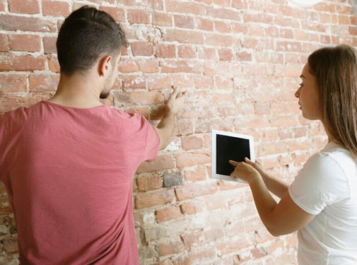 young-couple-doing-apartment-repair-together-themselves-1110x630